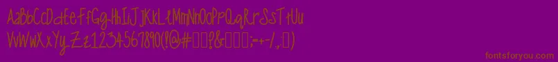 OneManWolfPack-fontti – ruskeat fontit violetilla taustalla