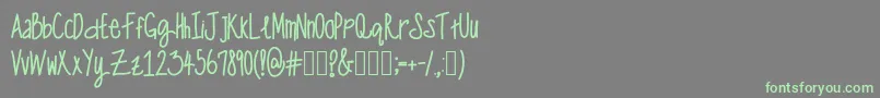 OneManWolfPack Font – Green Fonts on Gray Background