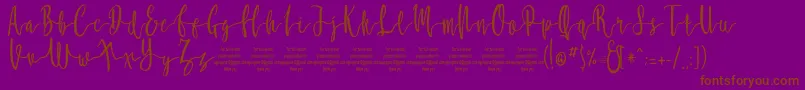 MollucaFree-Schriftart – Braune Schriften auf violettem Hintergrund