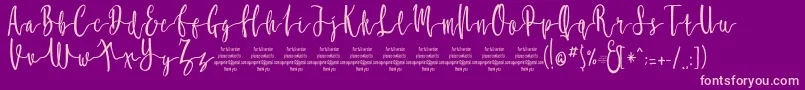 MollucaFree Font – Pink Fonts on Purple Background