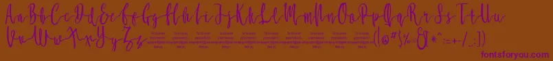 MollucaFree-Schriftart – Violette Schriften auf braunem Hintergrund