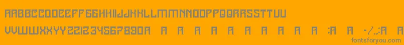 A25Kamadjaja-Schriftart – Graue Schriften auf orangefarbenem Hintergrund