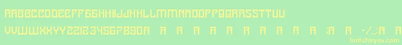 フォントA25Kamadjaja – 黄色の文字が緑の背景にあります