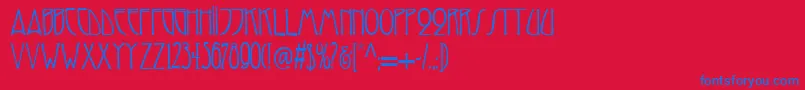 Reynoldartdeco Font – Blue Fonts on Red Background