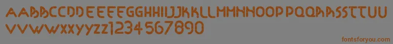 Articulada Font – Brown Fonts on Gray Background