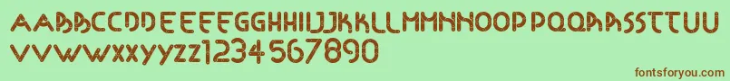 Articulada Font – Brown Fonts on Green Background