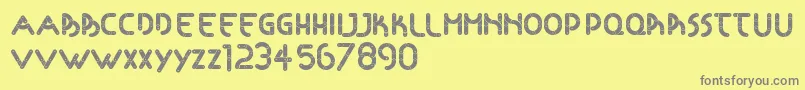 Articulada Font – Gray Fonts on Yellow Background