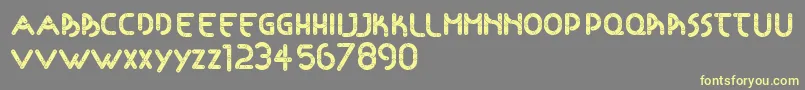 Articulada Font – Yellow Fonts on Gray Background