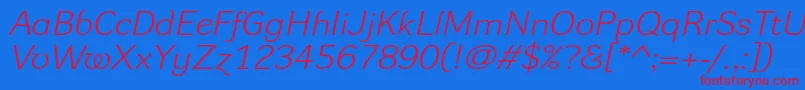 DynagrotesklxeItalic Font – Red Fonts on Blue Background