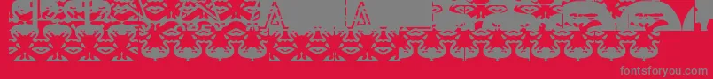 Fonte Obeywrappers – fontes cinzas em um fundo vermelho