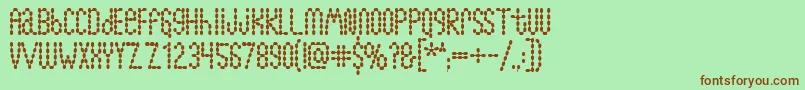 Lymphnodes Font – Brown Fonts on Green Background