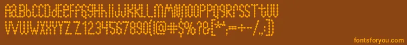 Lymphnodes Font – Orange Fonts on Brown Background