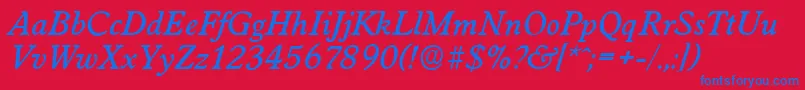 WorcesterserialMediumItalic-fontti – siniset fontit punaisella taustalla