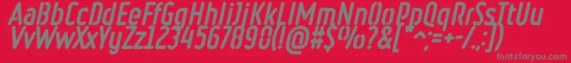 Fonte RulerStencilHeavyItalic – fontes cinzas em um fundo vermelho