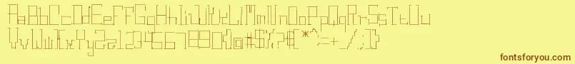 フォントDigitalRuins – 茶色の文字が黄色の背景にあります。