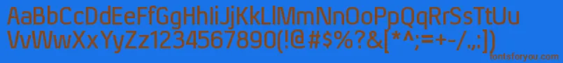 フォントXenusbRegular – 茶色の文字が青い背景にあります。
