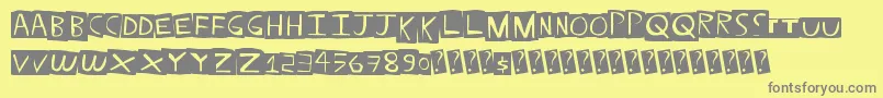 Straightballer-fontti – harmaat kirjasimet keltaisella taustalla