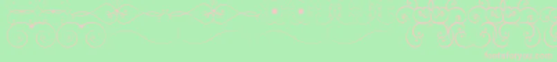 OrnametssTfb Font – Pink Fonts on Green Background