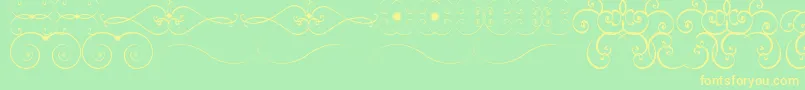 Czcionka OrnametssTfb – żółte czcionki na zielonym tle
