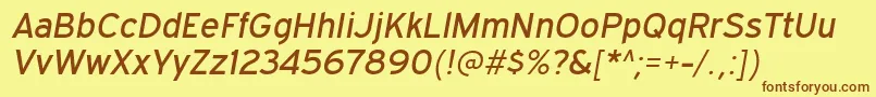 フォントExpresswayrgItalic – 茶色の文字が黄色の背景にあります。