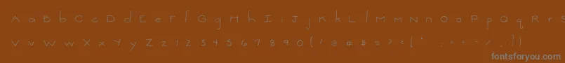 2peasThinkSmall Font – Gray Fonts on Brown Background