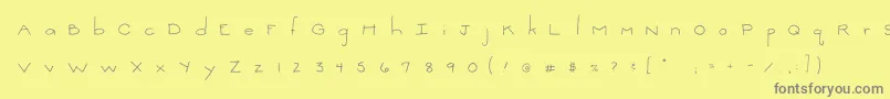 フォント2peasThinkSmall – 黄色の背景に灰色の文字