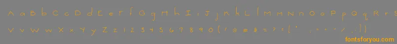 フォント2peasThinkSmall – オレンジの文字は灰色の背景にあります。