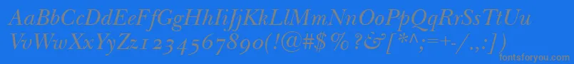 NewbaskervilleodttItalic-Schriftart – Graue Schriften auf blauem Hintergrund