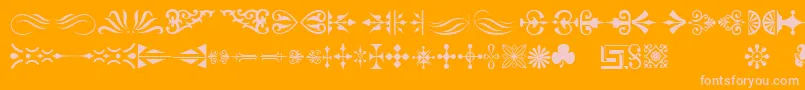 Ornamenttm-fontti – vaaleanpunaiset fontit oranssilla taustalla
