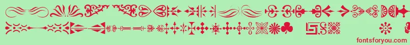 Czcionka Ornamenttm – czerwone czcionki na zielonym tle