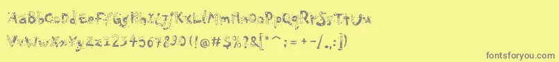 PfPlayskoolProConfetti-Schriftart – Graue Schriften auf gelbem Hintergrund