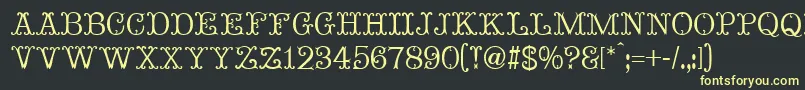 Шрифт MadameBovaryNormal – жёлтые шрифты на чёрном фоне
