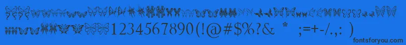 フォントTribalButterflies – 黒い文字の青い背景
