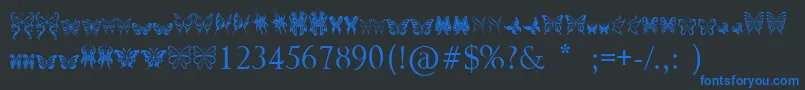 TribalButterflies Font – Blue Fonts on Black Background