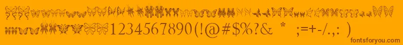 TribalButterflies Font – Brown Fonts on Orange Background