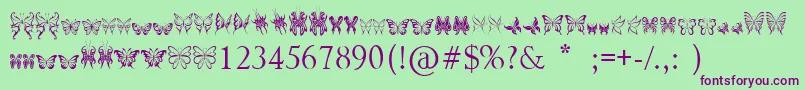TribalButterflies Font – Purple Fonts on Green Background