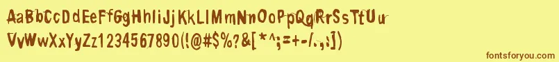 フォントContriteInSpirit – 茶色の文字が黄色の背景にあります。