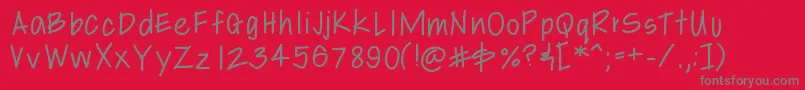 Libbyshand-Schriftart – Graue Schriften auf rotem Hintergrund