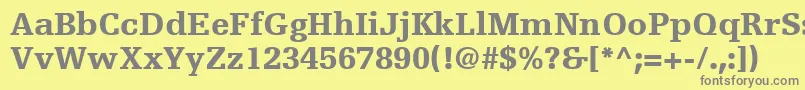 EgyptienneFLt75Black-Schriftart – Graue Schriften auf gelbem Hintergrund