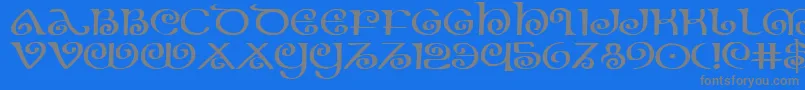 フォントTheShireExpanded – 青い背景に灰色の文字