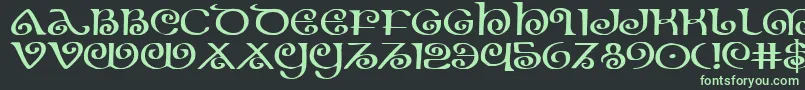 TheShireExpanded Font – Green Fonts on Black Background
