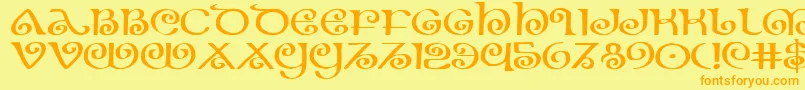 フォントTheShireExpanded – オレンジの文字が黄色の背景にあります。