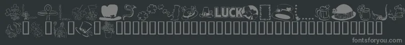 KrBitsOshea-fontti – harmaat kirjasimet mustalla taustalla