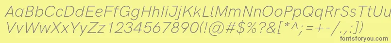 フォントHkgroteskLightlegacyitalic – 黄色の背景に灰色の文字