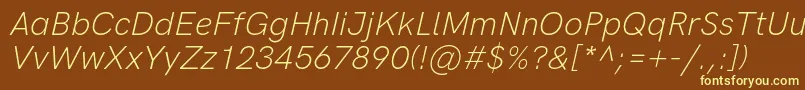 HkgroteskLightlegacyitalic Font – Yellow Fonts on Brown Background