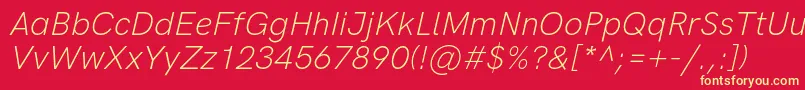 HkgroteskLightlegacyitalic-fontti – keltaiset fontit punaisella taustalla