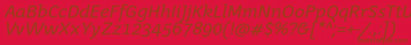 JuvenisbookItalic-Schriftart – Braune Schriften auf rotem Hintergrund