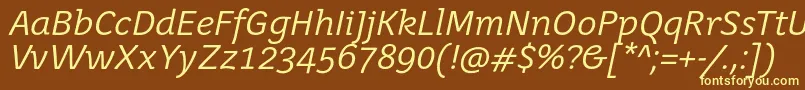 JuvenisbookItalic-fontti – keltaiset fontit ruskealla taustalla