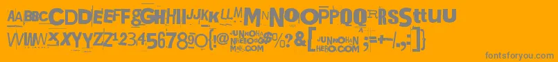 Kuusinollakahdeksan-Schriftart – Graue Schriften auf orangefarbenem Hintergrund