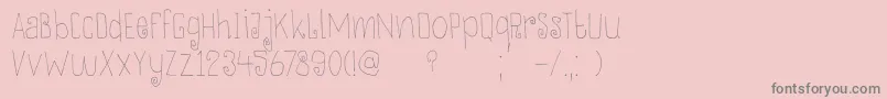 フォントDkThievery – ピンクの背景に灰色の文字